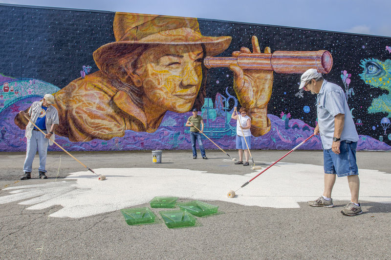 Volunteers fuel WaterFire success paint